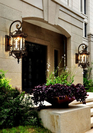 Helen - Rustic Water Glass Wall Sconce with Metal Scrolled Arm, Single Bulb Coffee Lantern